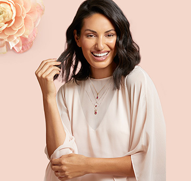 Woman modeling jewelry.