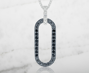 Black and White Diamond Accented Pendant in Sterling Silver
