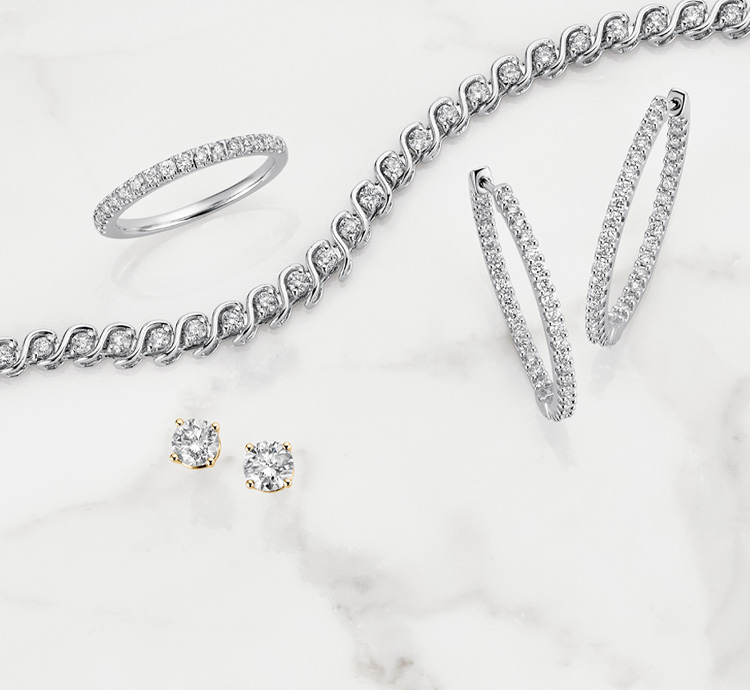 Diamond ring, bracelet and earrings.
