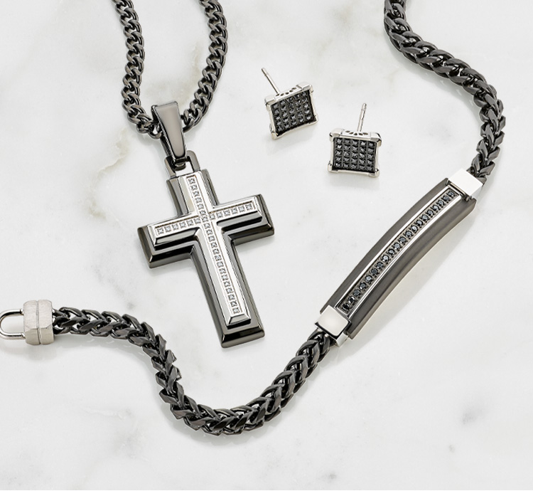 Men's bracelet, cross pendant and earrings.