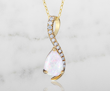 Opal and Diamond Accented Pendant in 10K Yellow Gold