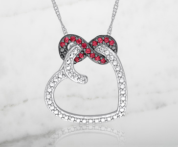 Ruby and 1/6 ct. tw. Diamond Infinity Heart Pendant in 10K White Gold