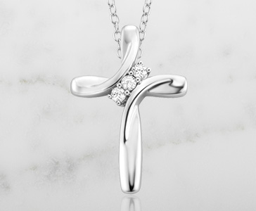 1/10 ct. tw. Diamond 3-Stone Trinity Cross Pendant in Sterling Silver