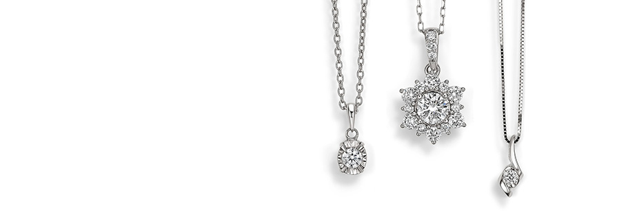 Three diamond pendants.