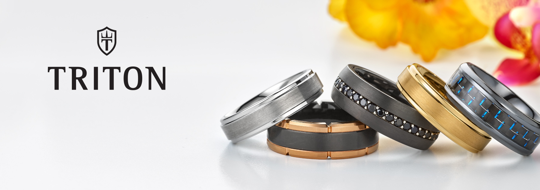 Triton logo and selection of rings.