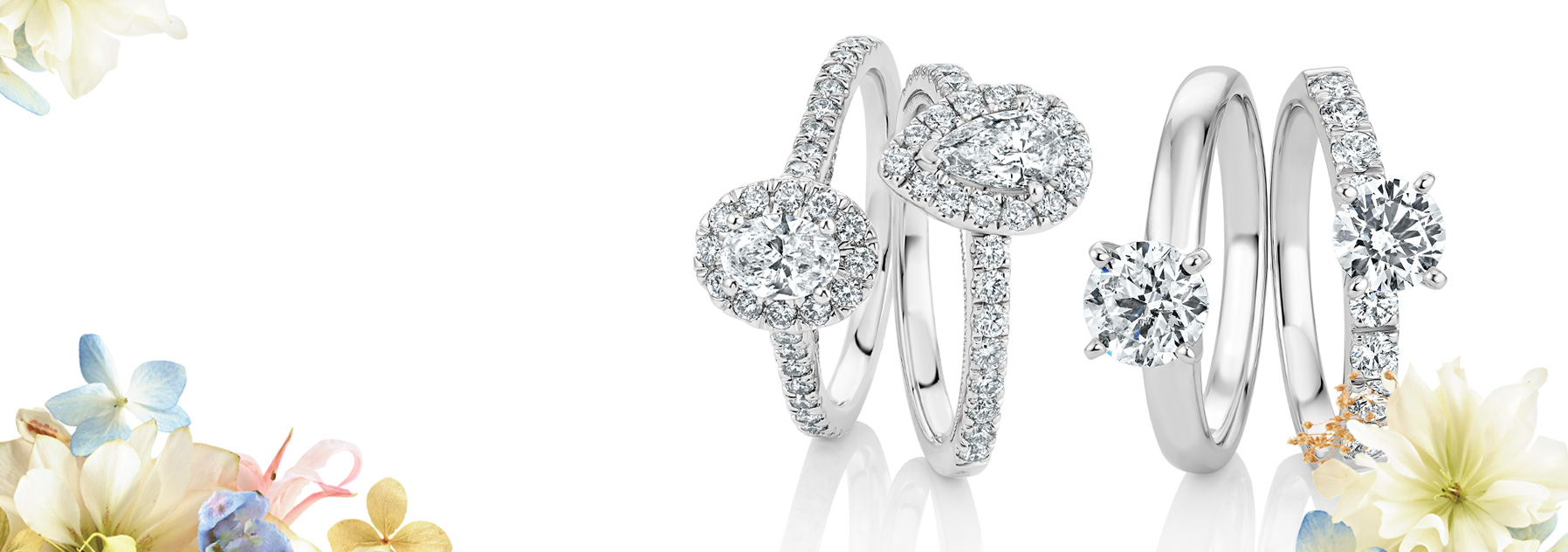 Assortment of diamond engagement rings.